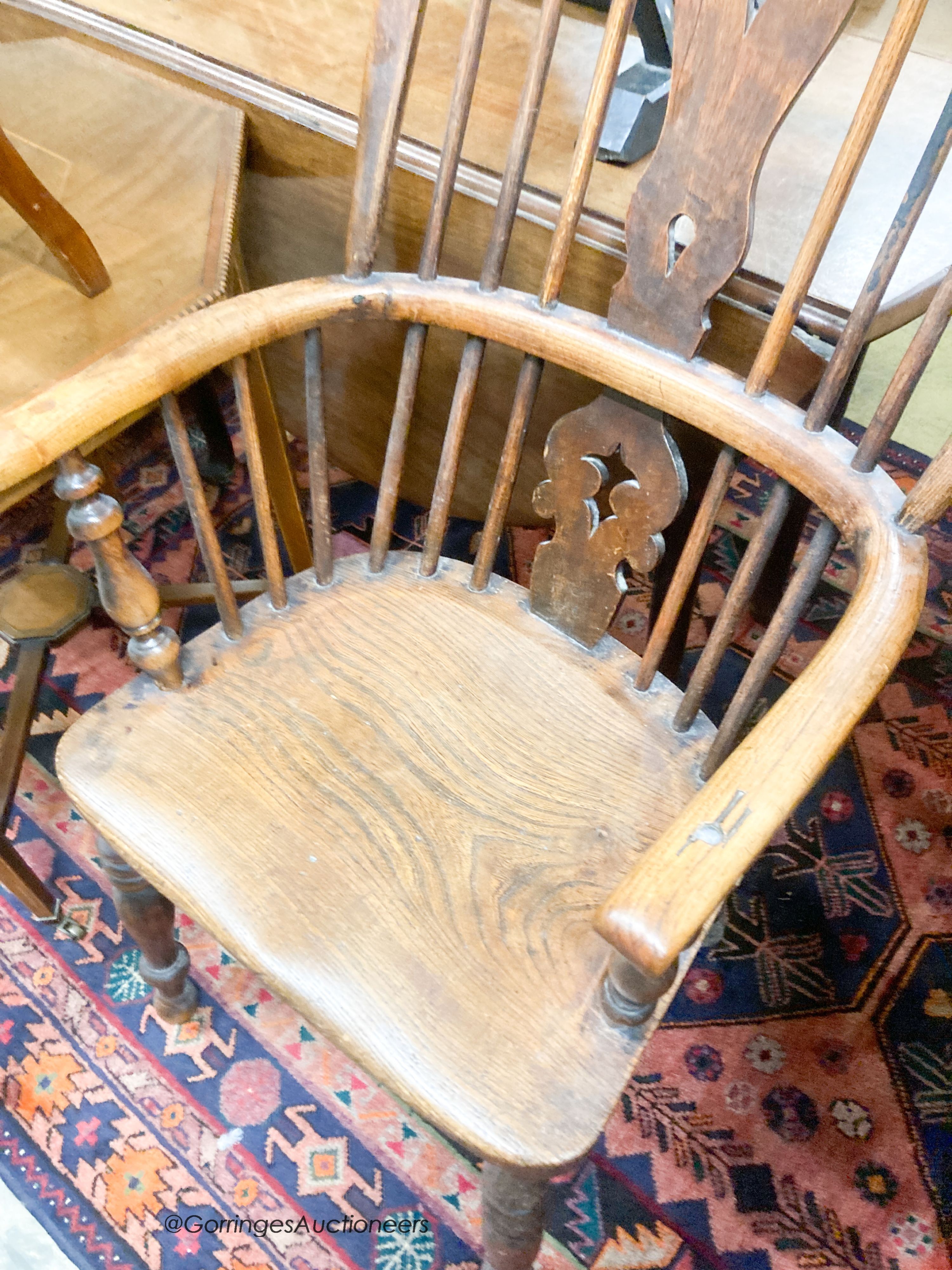 A Victorian elm and ash Windsor armchair, width 54cm, depth 44cm, height 108cm